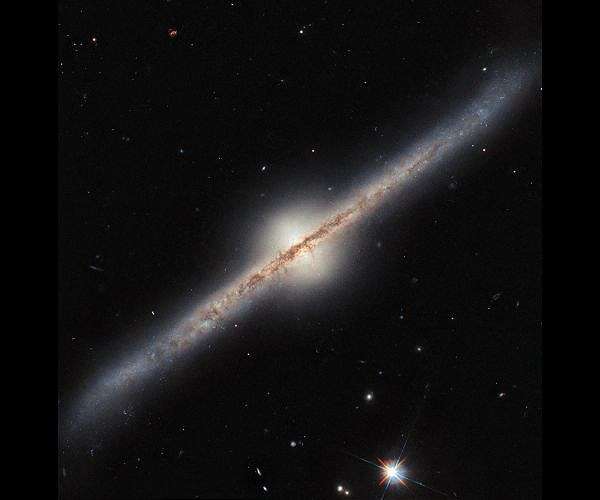 Hubble Reveals Unique Edge-On Spiral Galaxy UGC 10043